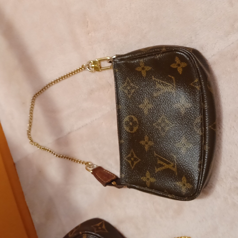 Pouchette louis vuttion